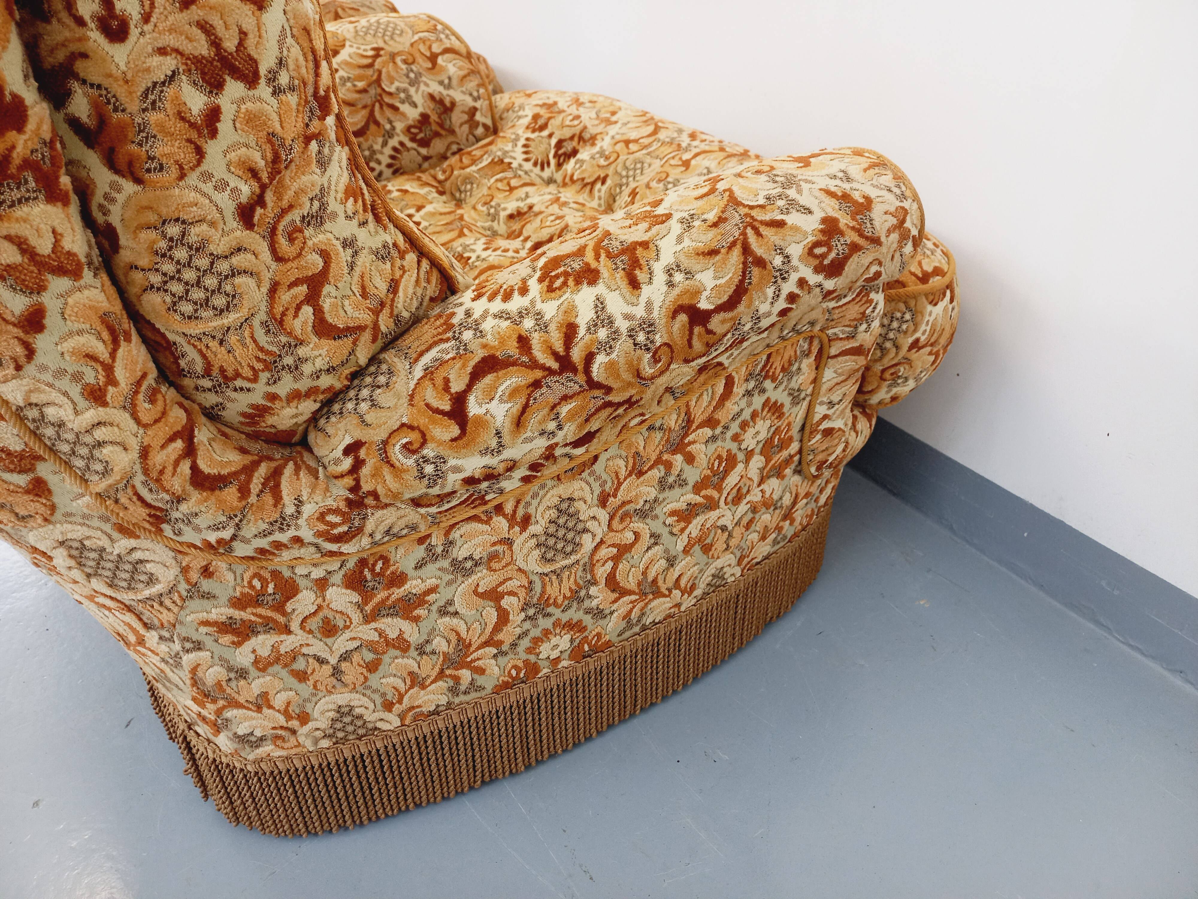 Set of 2 vintage armchairs in floral fabric with fringes from the 60s 70s
