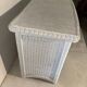White rattan bedroom set: chest of drawers, mirror, bed, basket