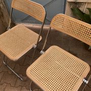Plia chairs by Castelli in wood and cane.
