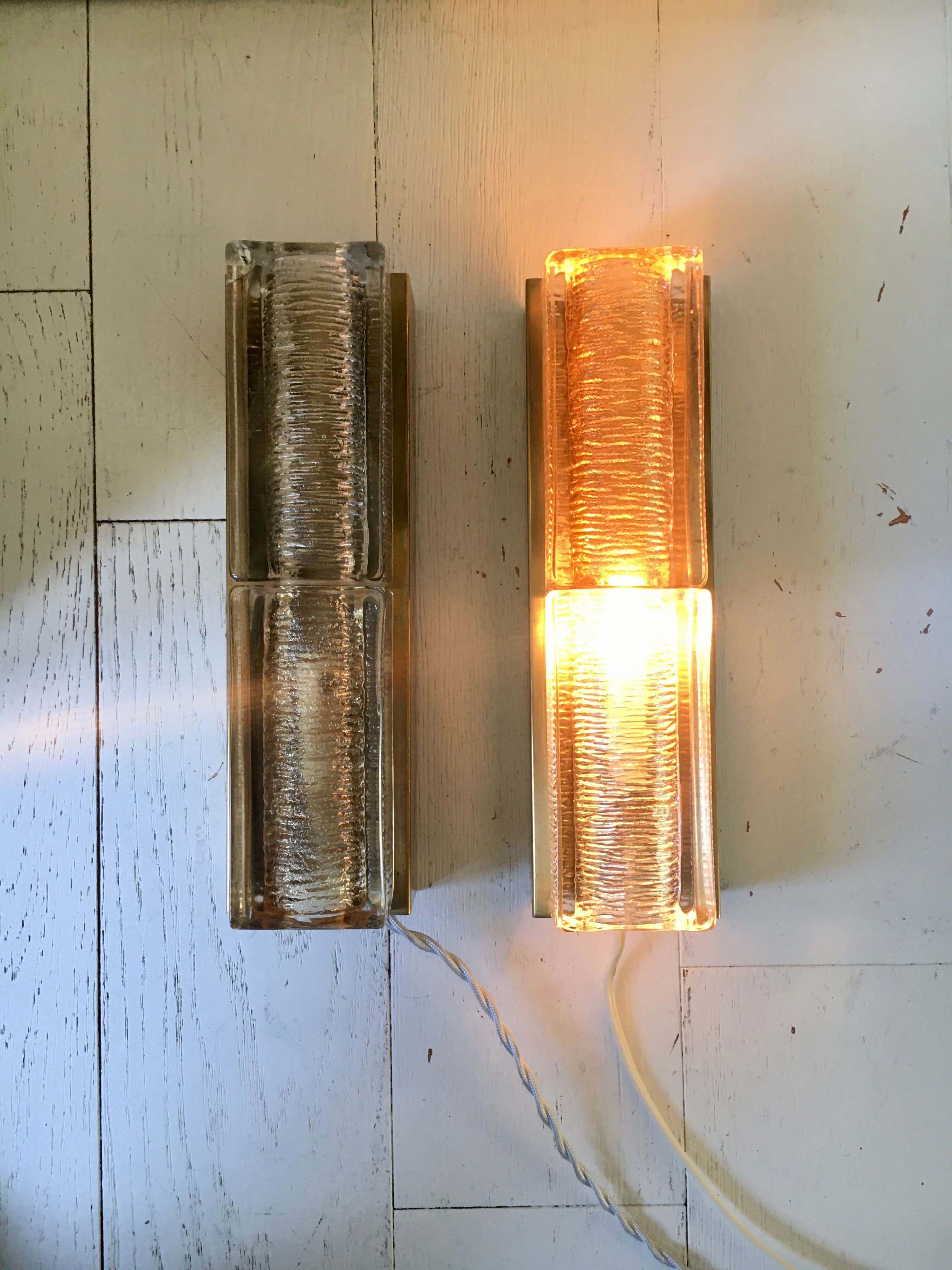 Pair of Vitrika wall lamps in glass and brass