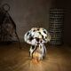 Mosaic glass mushroom lamp in black, white, and amber.