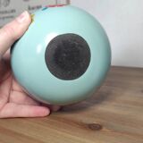 Floral candle holder in enamelled metal