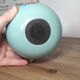 Floral candle holder in enamelled metal