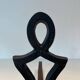 Pair of Cast Iron Chenets with Figurative Anthropomorphic Silhouette, by Raymon