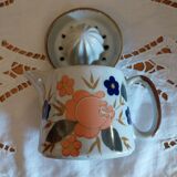 Lemon squeezer and its vintage ceramic pot