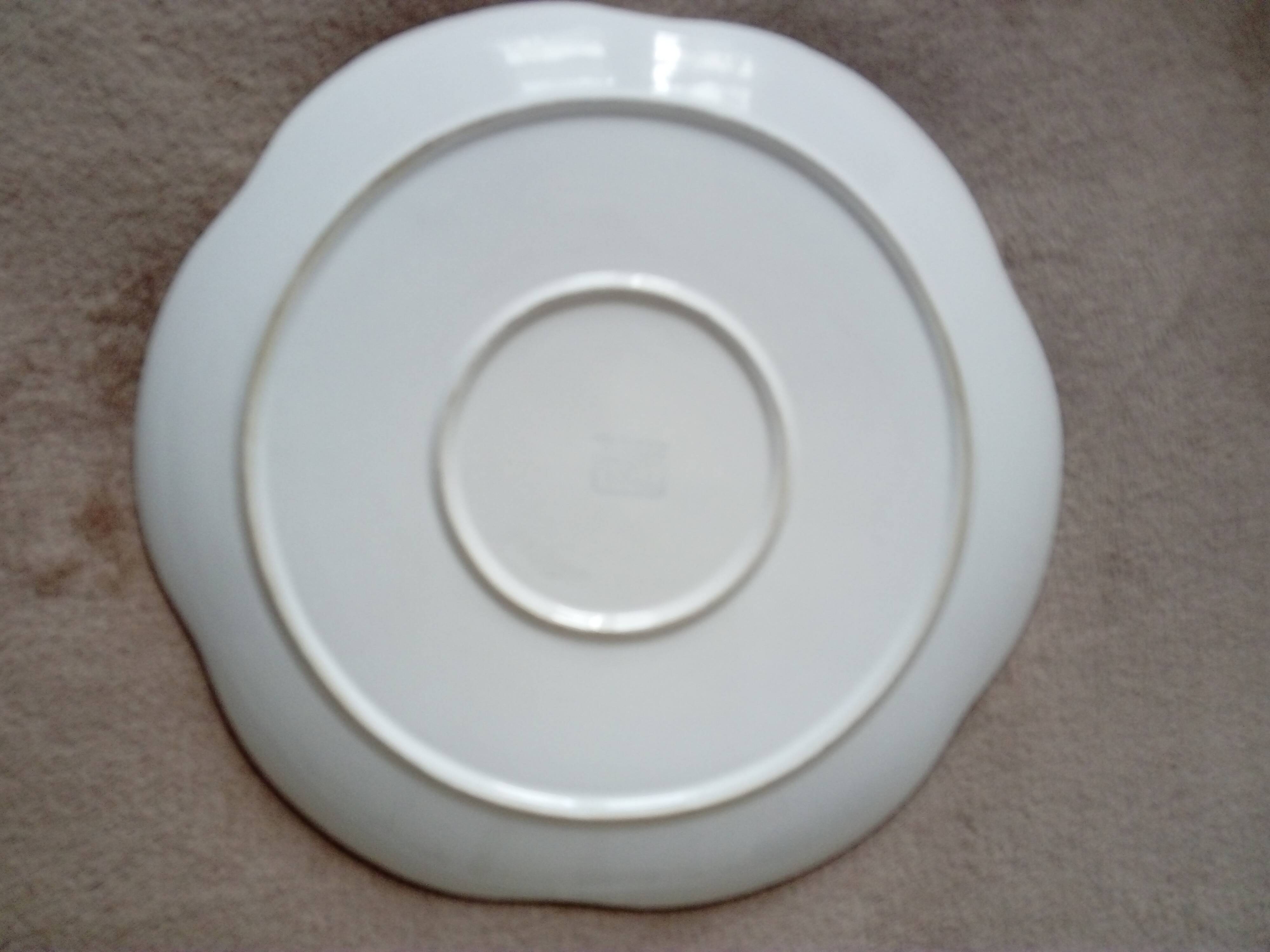 Large white multi-lobed pie or cake dish