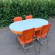 Formica leatherette chair with orange table, vintage 70s Space Age