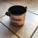 Old copper pot cover with cove