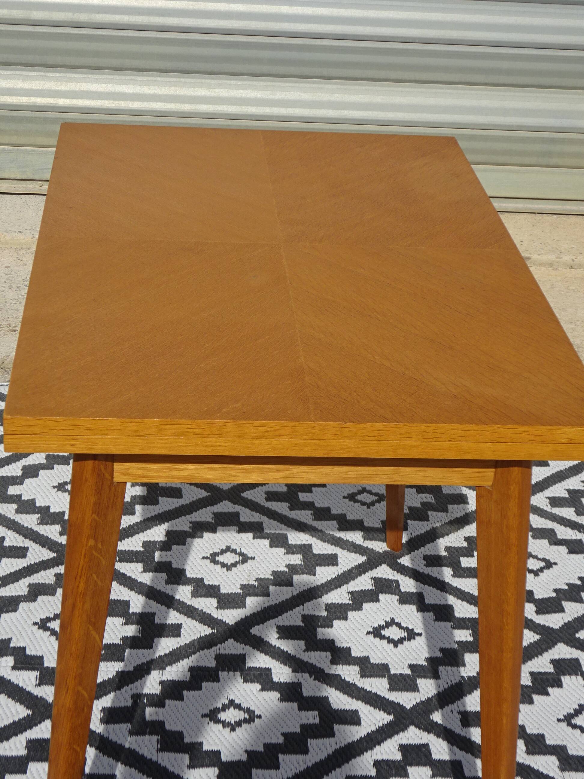 Scandinavian portfolio table model "half-century" by SAM