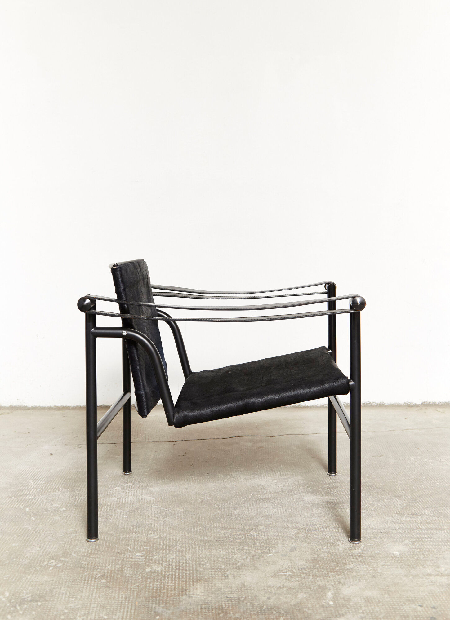 LC1 armchair by Le Corbusier, Perriand, & Jeanneret for Cassina