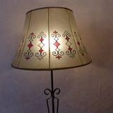 Tripod floor lamp with metal base and skin shade