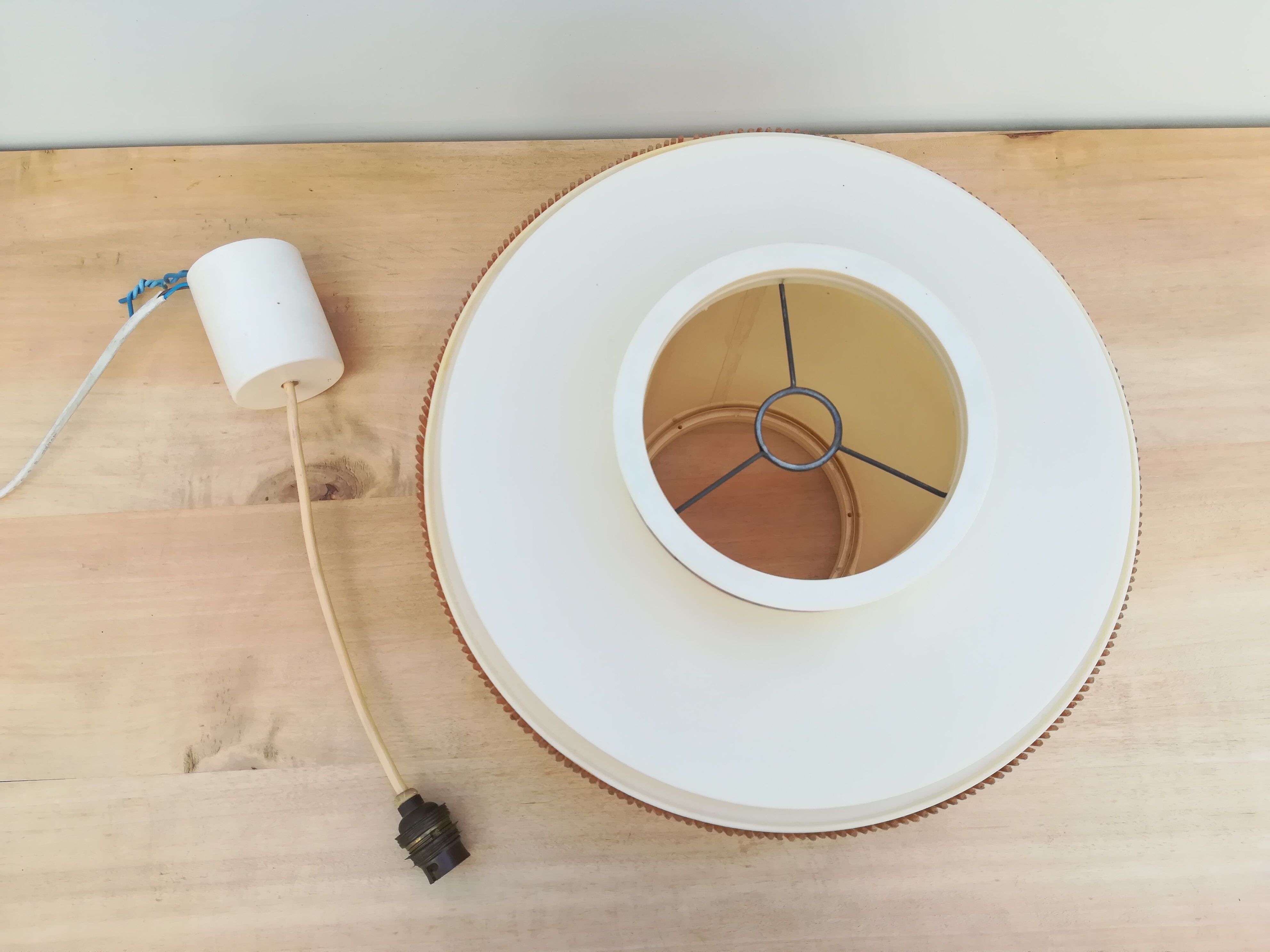 Plastic suspension and rattan