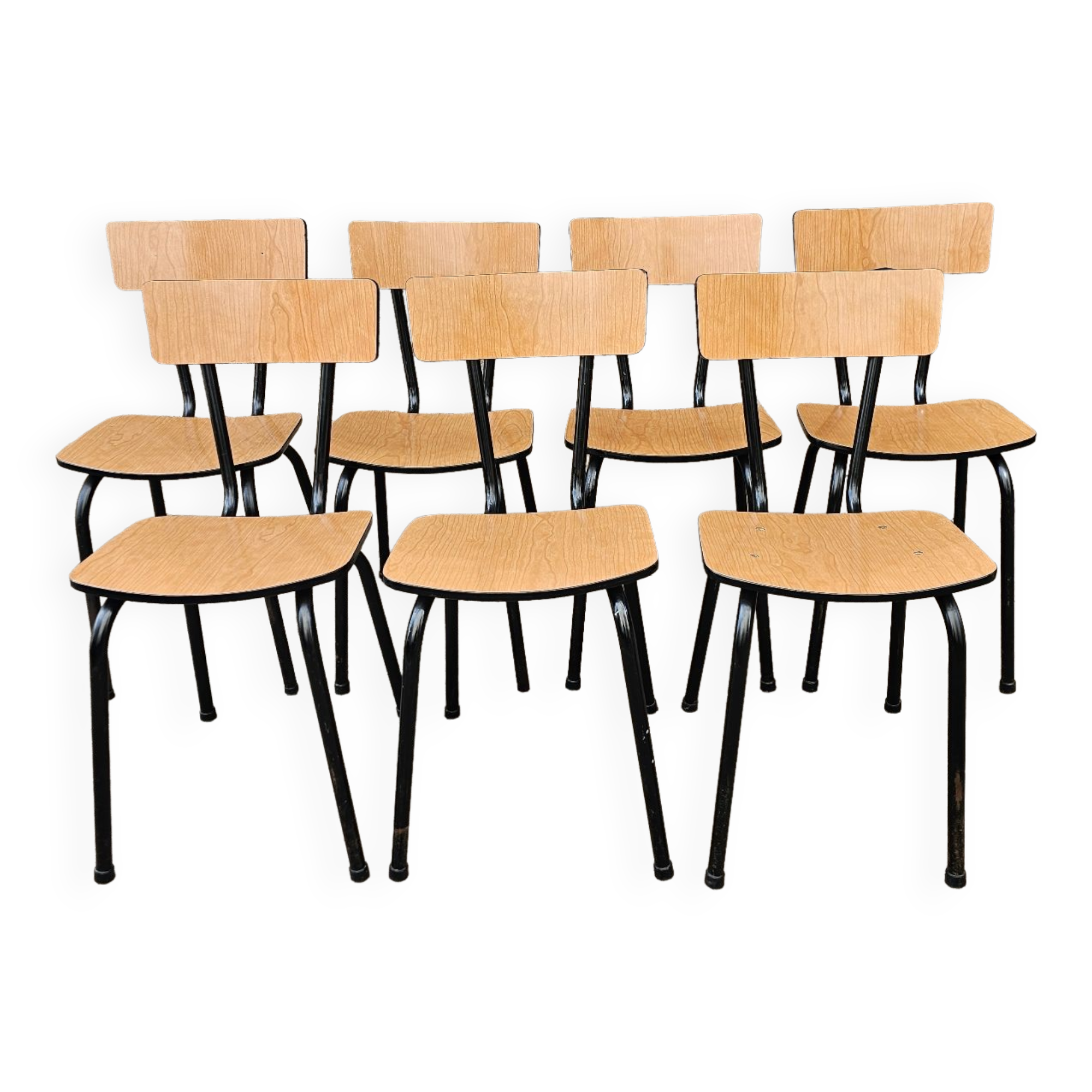 Chairs in black and light brown formica