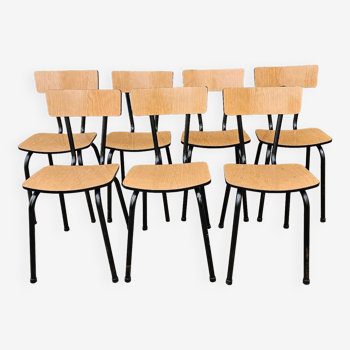 Chairs in black and light brown formica