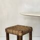 Solid oak stool with woven hemp seat by Audoux Minnet.