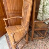 Pair of Renaissance style carved walnut armchairs