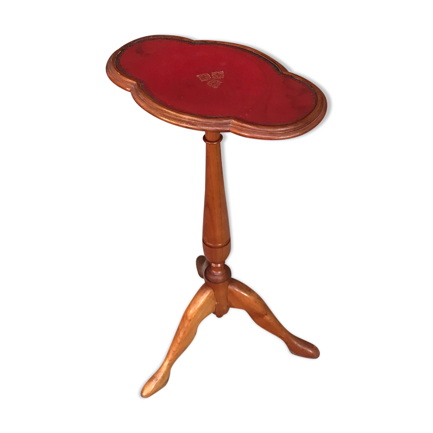 Wooden pedestal table red leather top