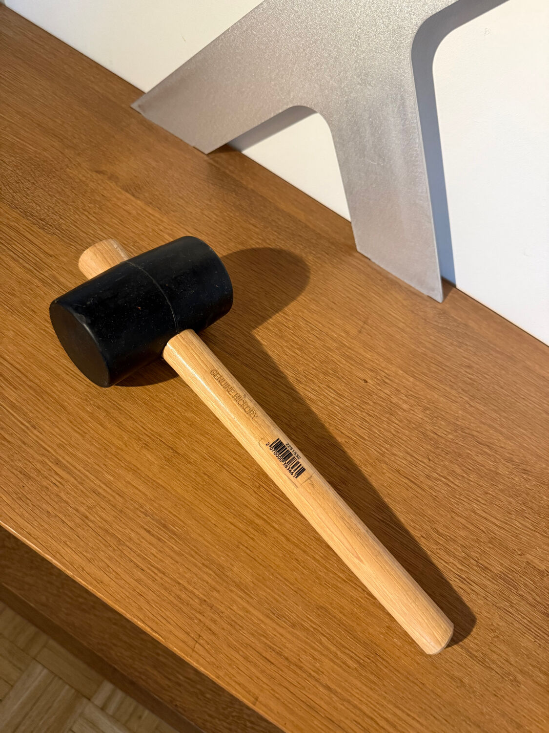 Designer shelf in solid oak and signed aluminium.