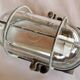 Pair of oval porthole wall lights in bakelite and glass