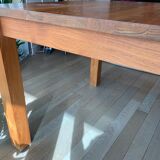 Teak dining table with extension cords