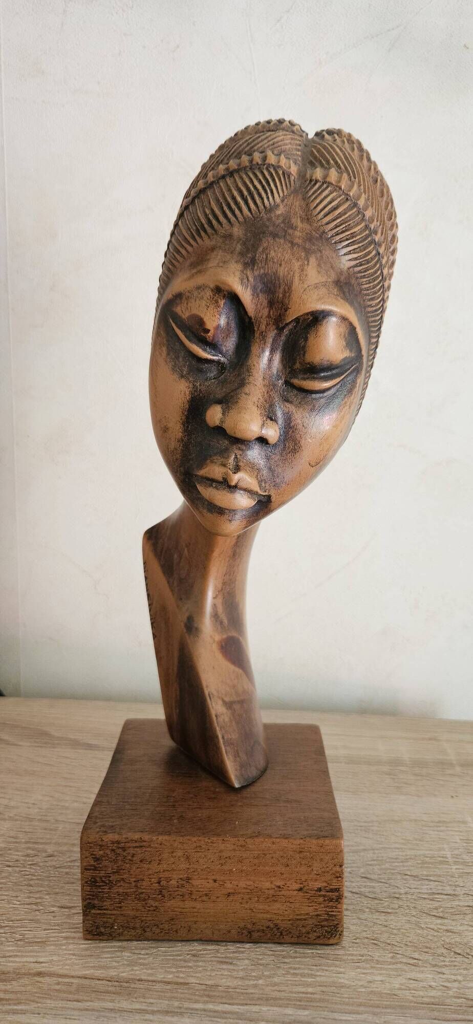Bust of an African woman in precious wood