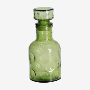 Green bottle made of old glass
