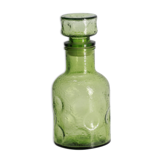 Green bottle made of old glass