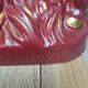 Vintage sculpture of mare and foal signed Jean – red ceramic and gilding.