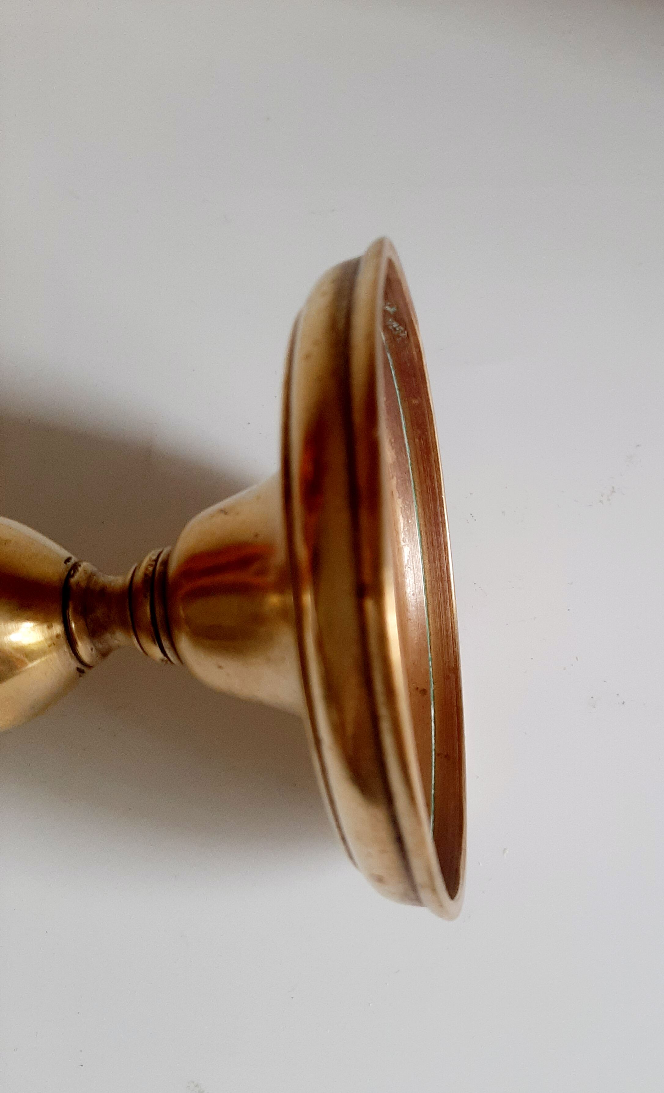 Golden brass candle holder