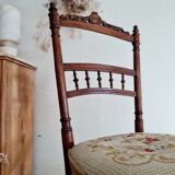 Antique chair turned wood sitting velvet flowers