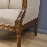 Wingback armchair in walnut, Louis XVI style – late 19th century