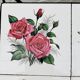 Vintage coffee table in wrought iron with floral tiles.