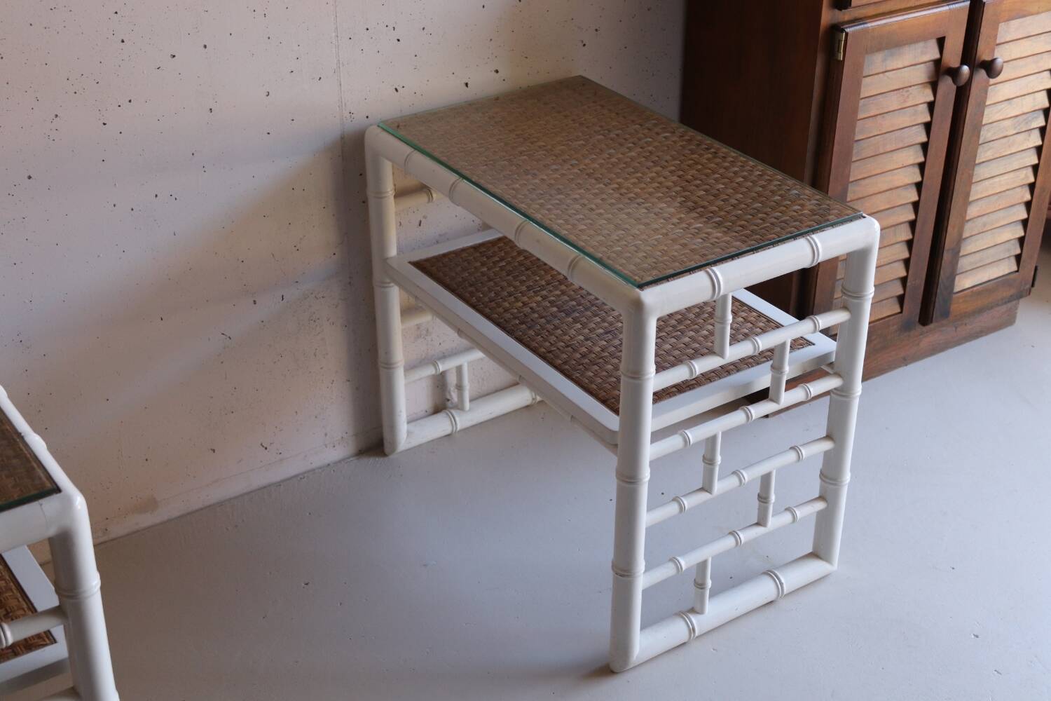 Pair of bedside tables in bamboo effect wood and woven wicker