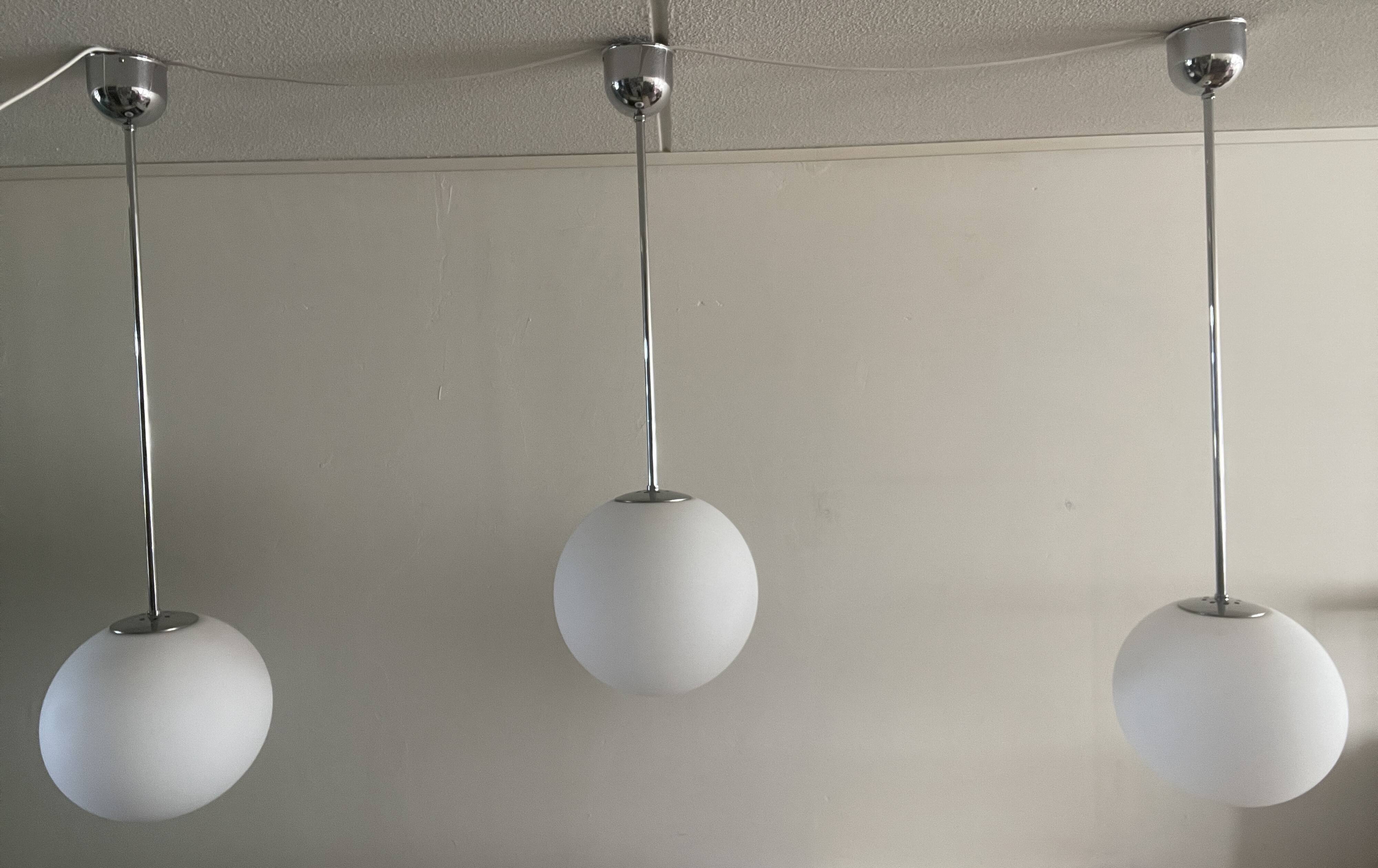 3 Giso ball pendant lights by Gispen