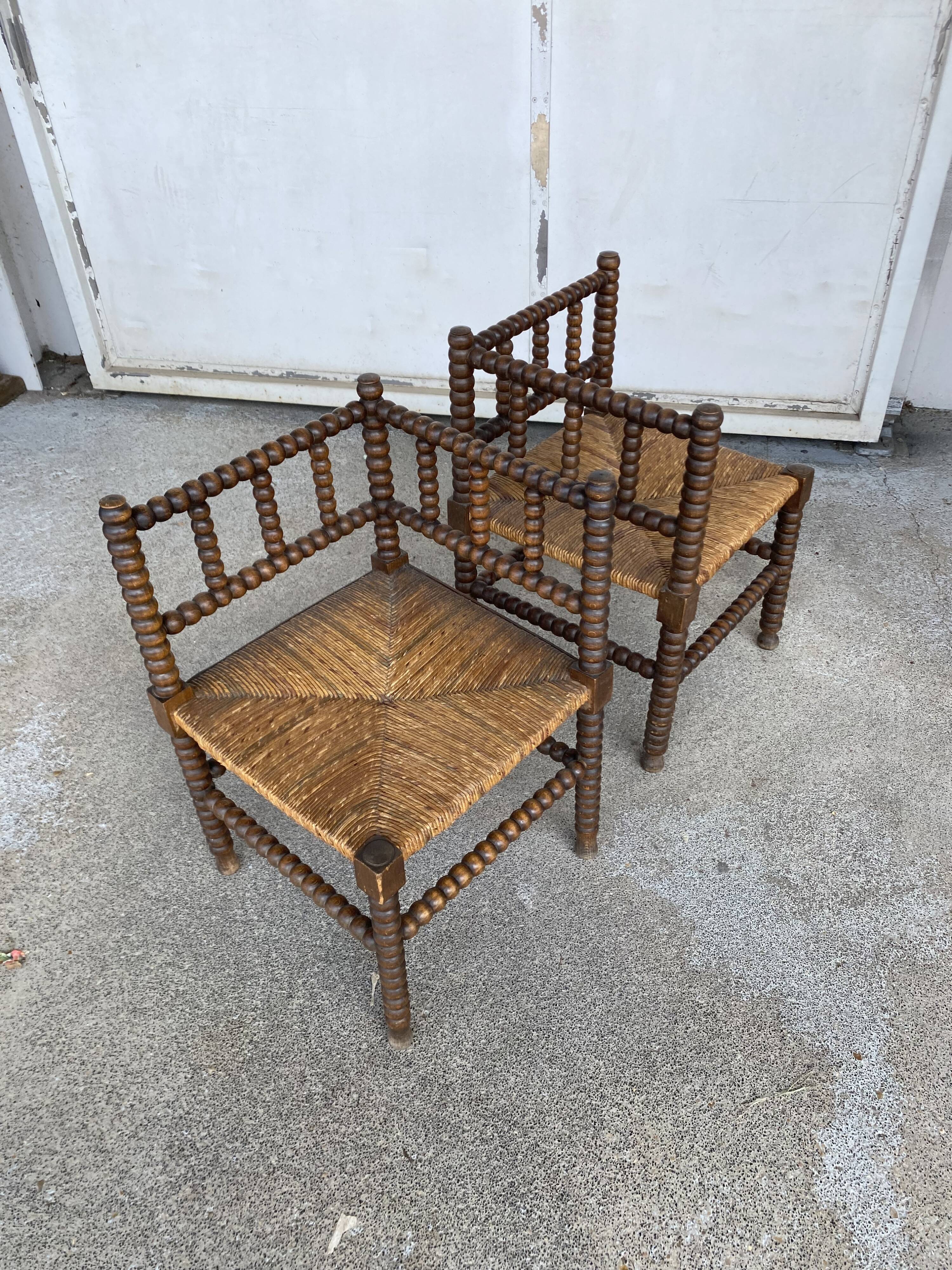 Pair of beaded armchairs