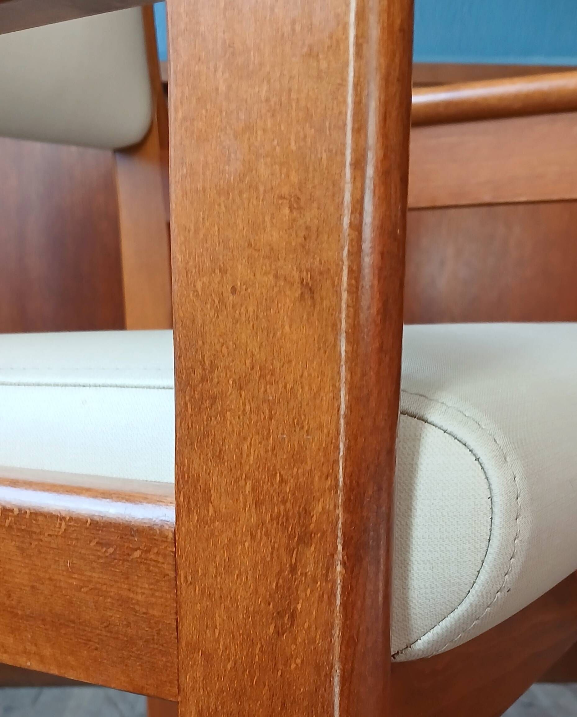 Armchair by André Sornay, stained solid beech & beige faux leather. 1980