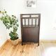 Rattan and cane bookshelf shelf