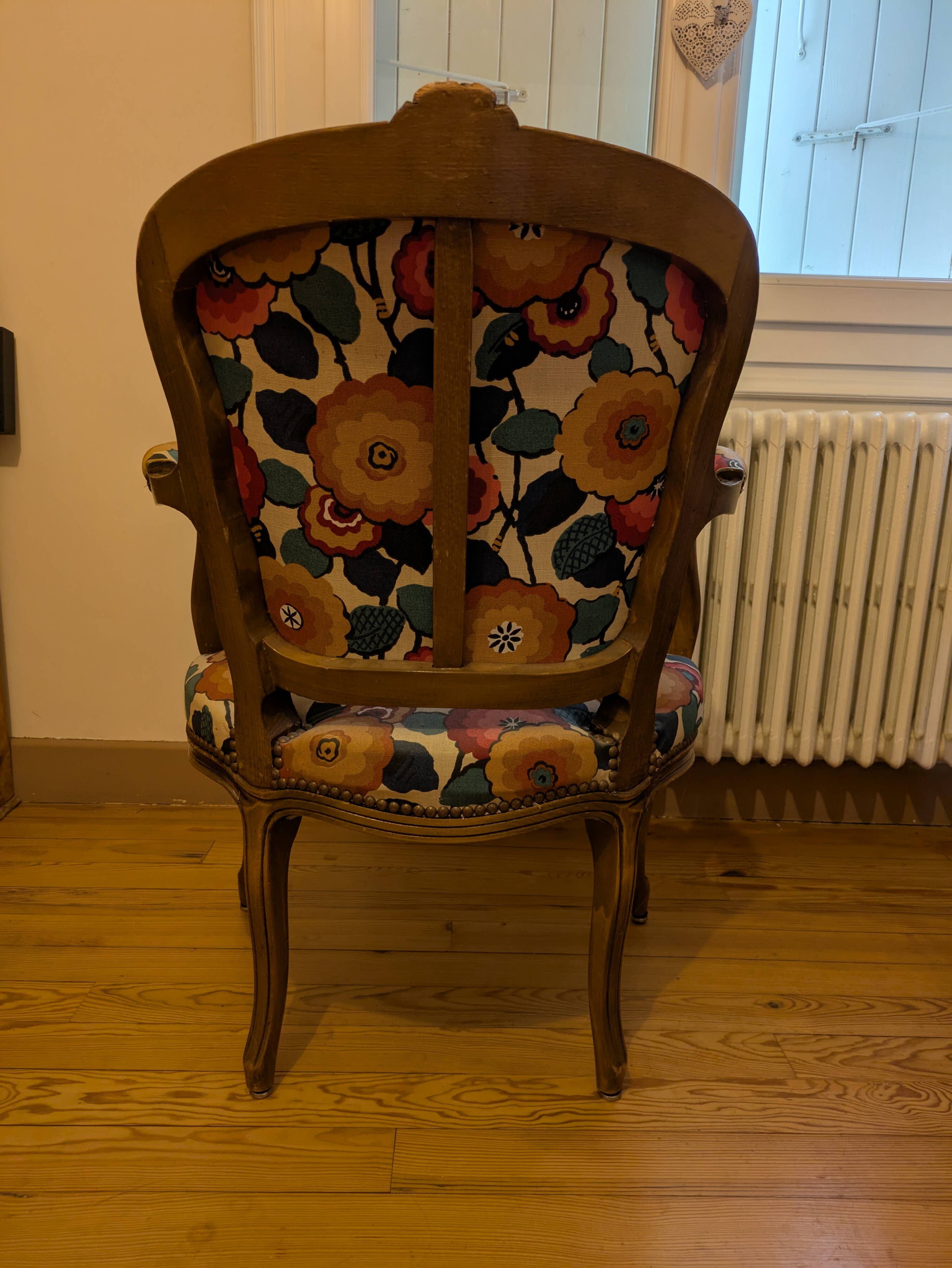Voltaire armchair with a rack, wheels, and a toad chair in matching fabric.