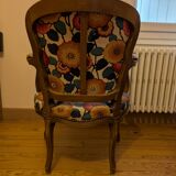 Voltaire armchair with a rack, wheels, and a toad chair in matching fabric.