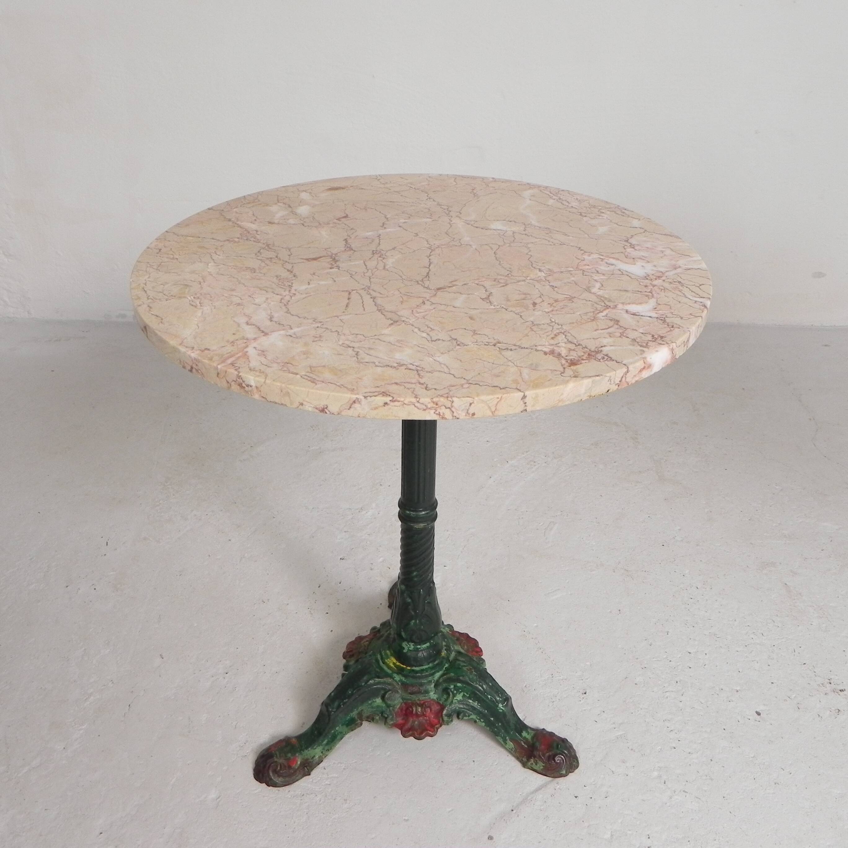Bistro table with cast iron legs and marble top, 1920s.