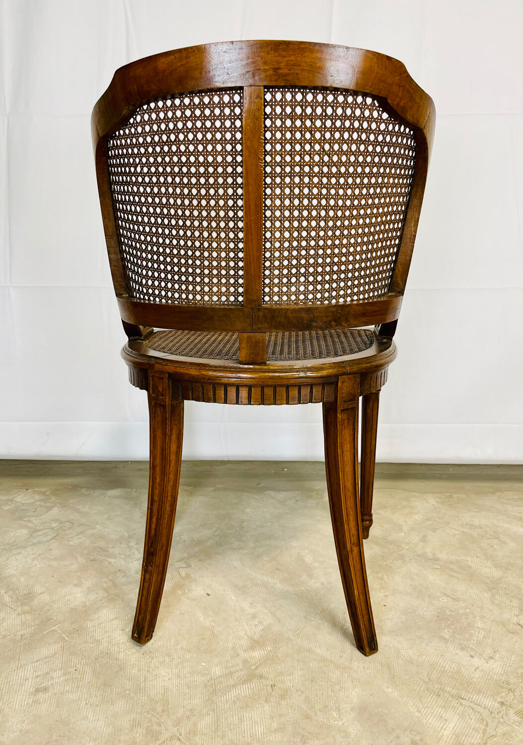 Small cané armchair
