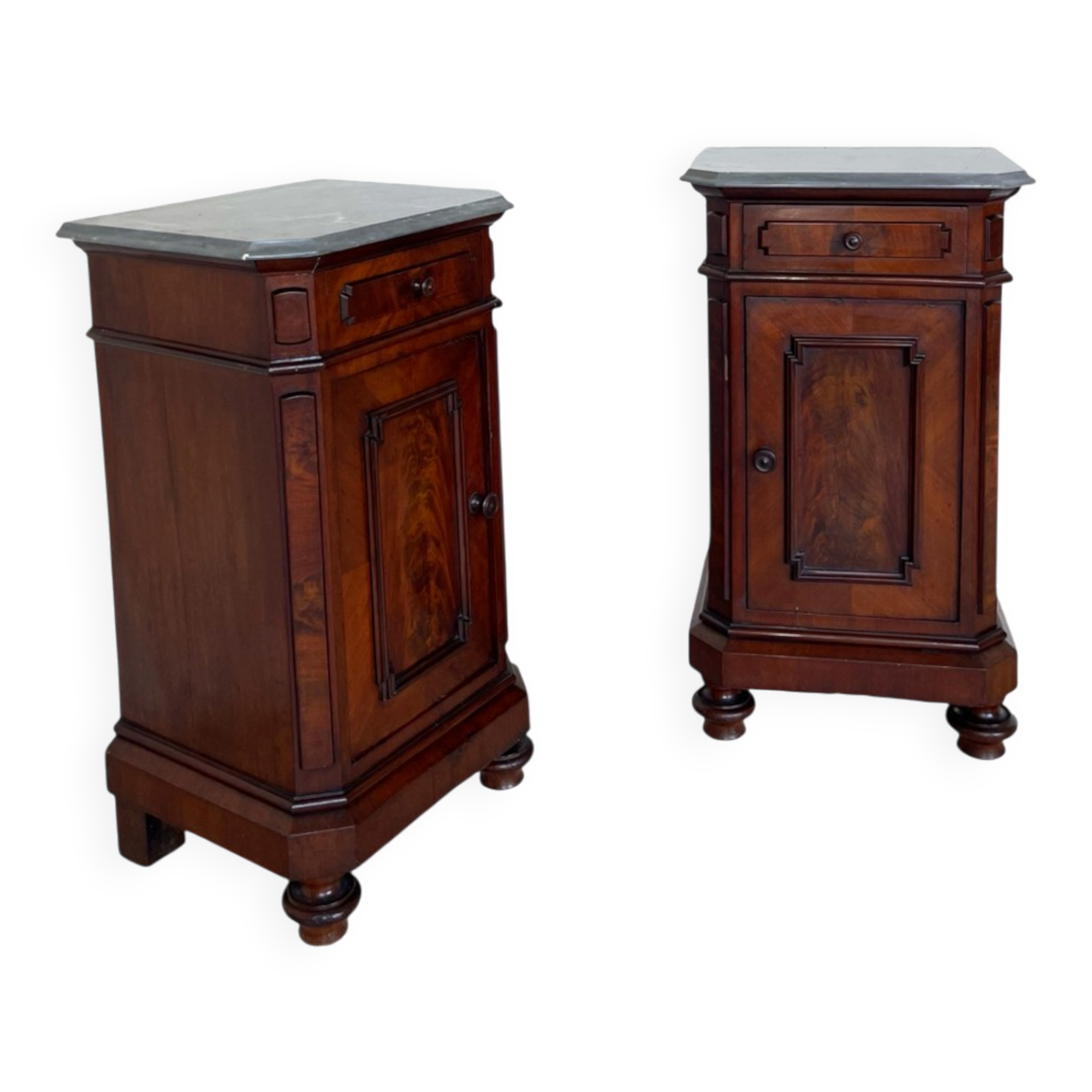 A pair of antique walnut bedside tables from the 1890s.