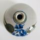 Ceramic bud vase with floral decoration