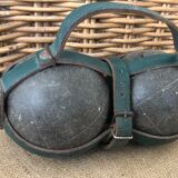 Petanque balls in their strap bag