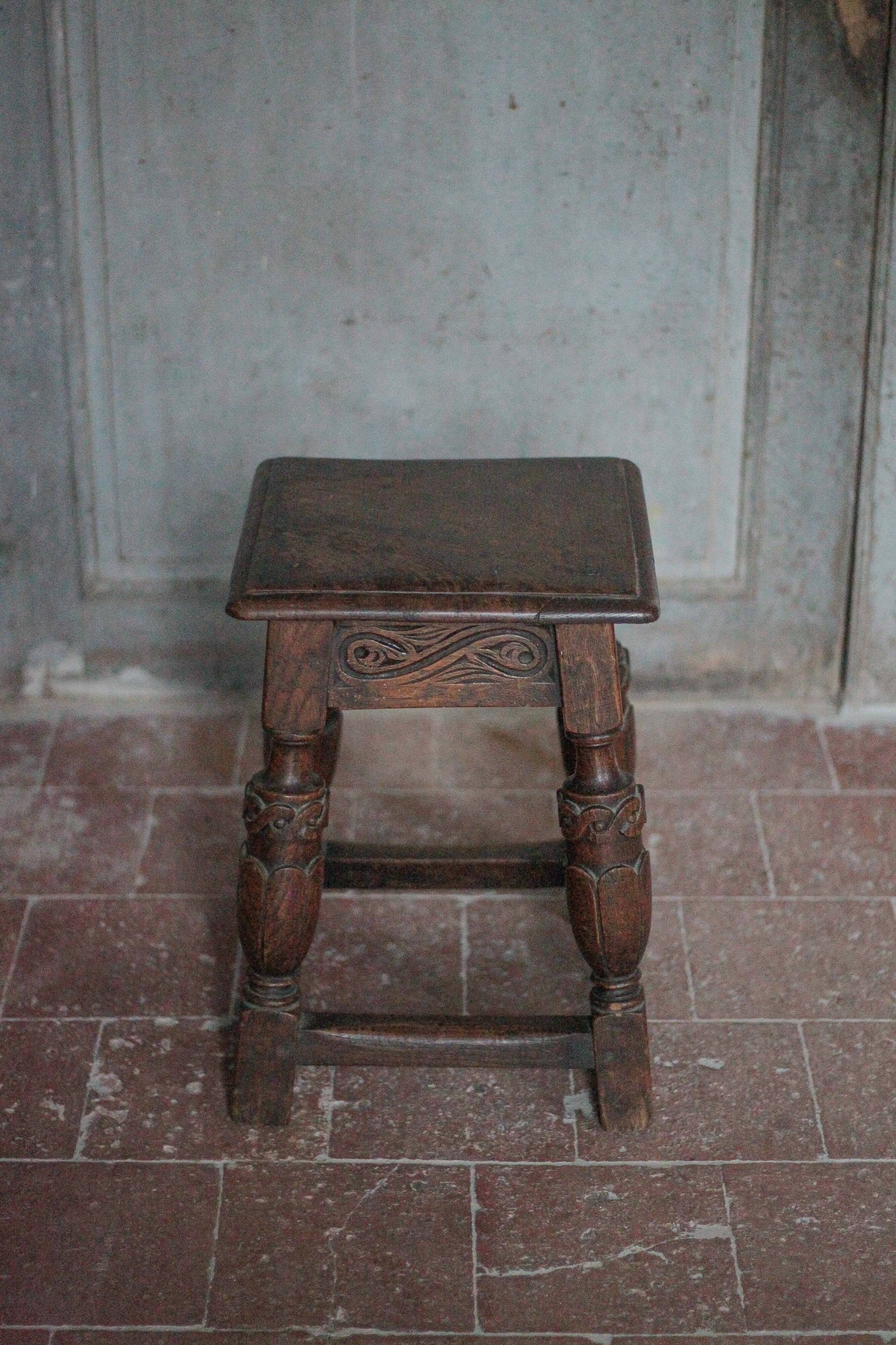 Antique wooden stool in Elizabethan English style, occasional stool