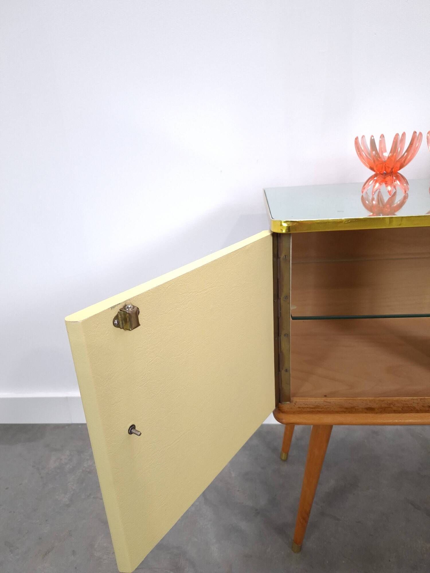 Vintage green DDR cabinet, model Libelle with glass top, slanted legs.