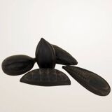 Set of decorative fruits in carved blackened wood.