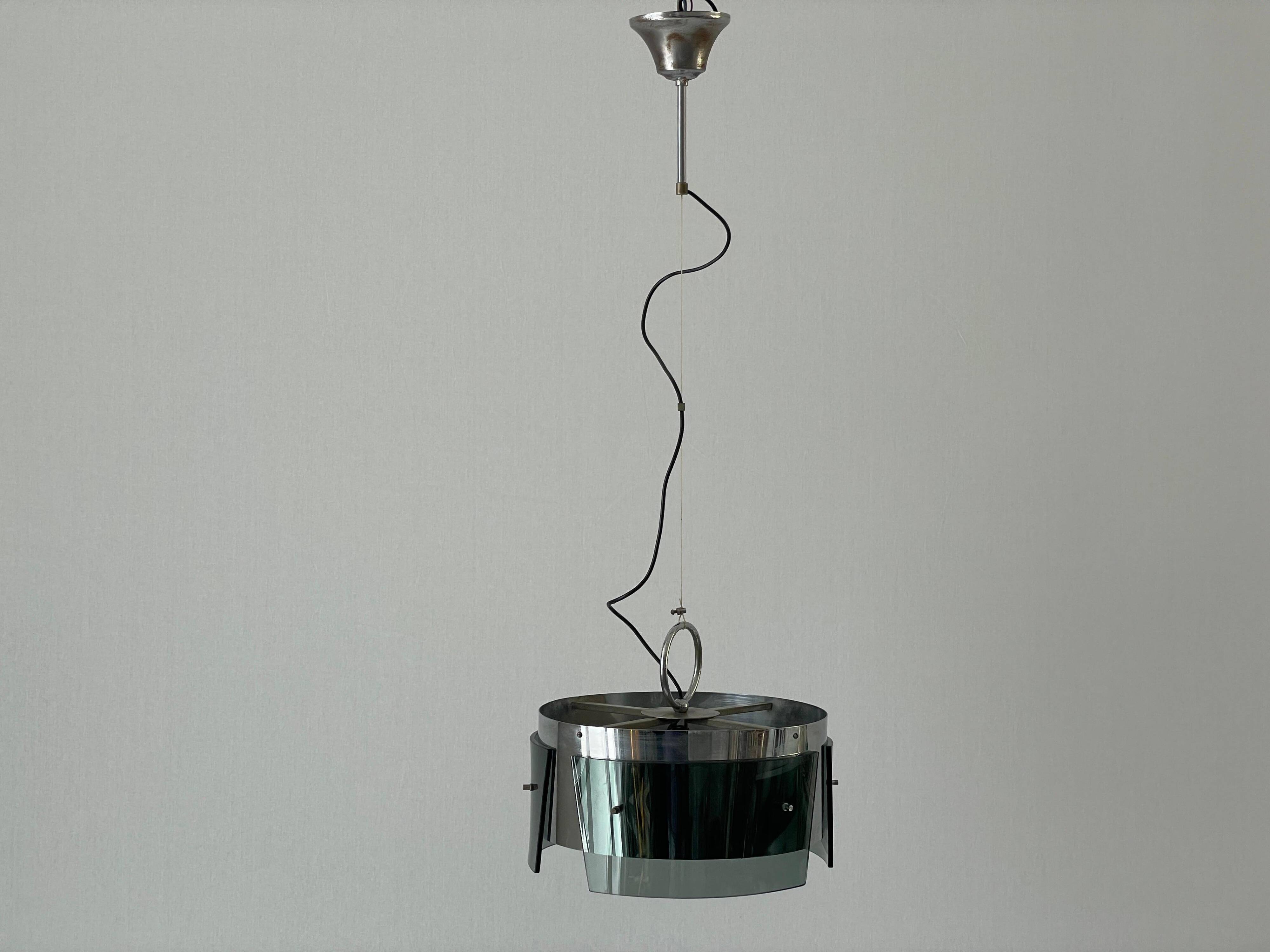 Suspended lamp in green glass and chrome, 1960s, Italy