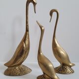 Trio of brass geese