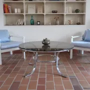 Round coffee table in smoked glass and chrome – Space Age style, 1970s